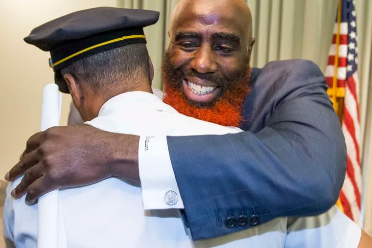 Tariq El-Shabazz (right) is a high-ranking official in the Philadelphia's Sheriff's Office. He was hired in May 2021, but he continued to represent alleged criminals charged in the city.
