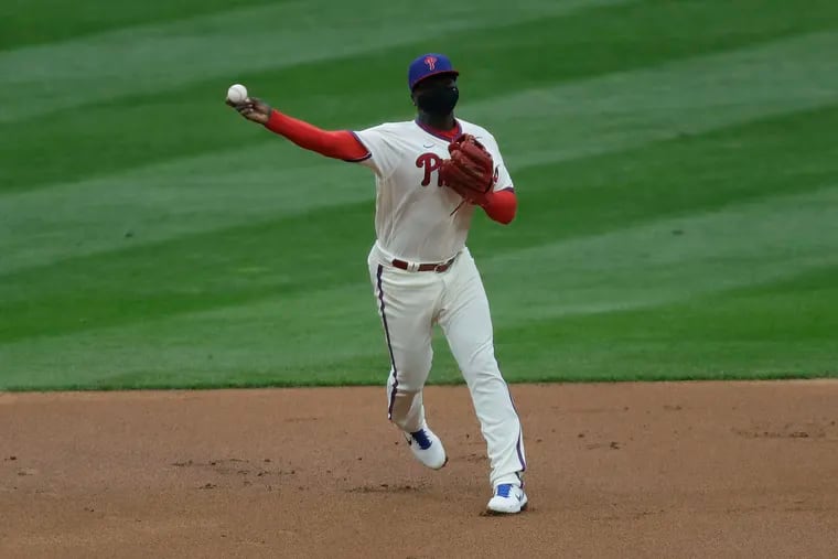 Phillies shortstop Didi Gregorius throws to first base against the St. Louis Cardinals on  April 17.