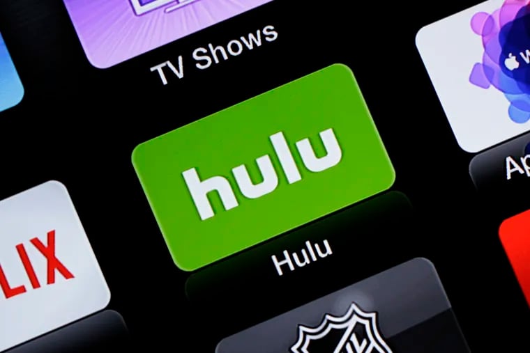 FILE- This June 24, 2015, file photo shows the Hulu Apple TV app icon in South Orange, N.J. AT&T has sold its 9.5% share in Hulu back to the streaming TV company, leaving Disney and Comcast as its sole owners. (AP Photo/Dan Goodman, File)