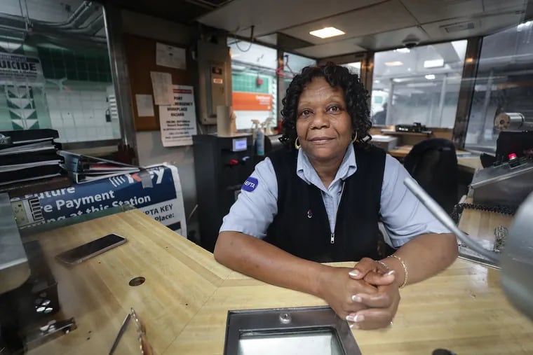 Cashier Joyce Woolford at SEPTA's Erie Station on the Broad Street Line in Philadelphia. Cashiers are asked to call police to report scams.