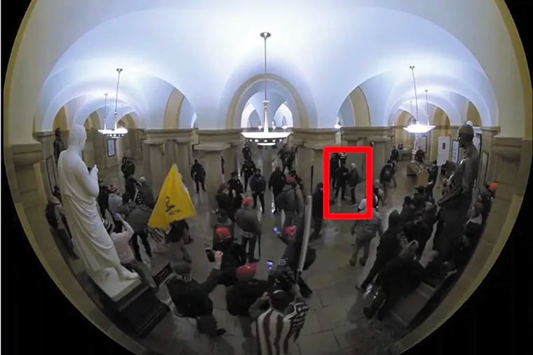 A still from Capitol security footage included in Justice Department court filings shows what prosecutors describe as Gary Wickersham, of West Chester, confronting officers in the Capitol crypt on Jan. 6.
