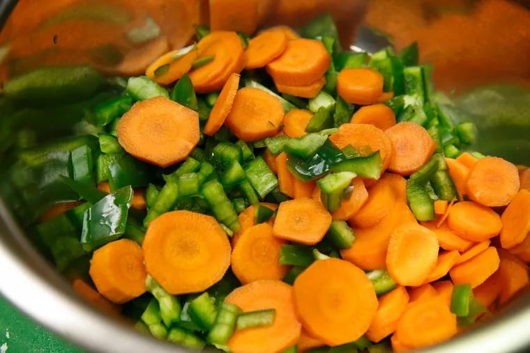 A bowl of vegetables prepped during a Health Promotion Council seminar, where instructors work on healthy cooking with cooks on staff at city agencies and city-funded programs.