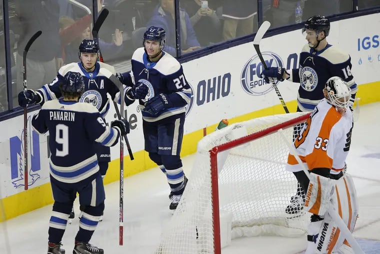 The Columbus Blue Jackets celebrate one of their six goals Thursday against the Flyers.