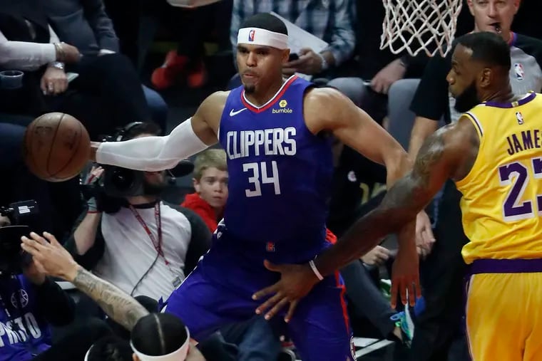 The Los Angeles Clippers' Tobias Harris (34) dishes off a pass in the first quarter against the Los Angeles Lakers on Thursday, Jan. 31, 2019, at Staples Center in Los Angeles. (Luis Sinco/Los Angeles Times/TNS)