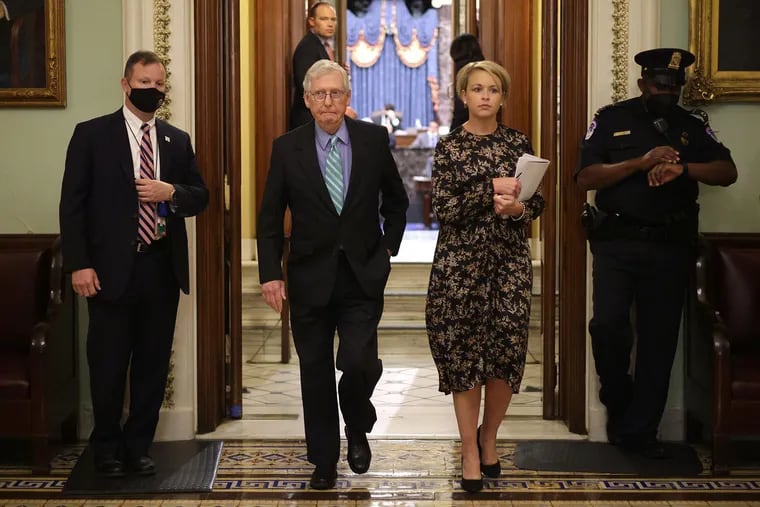 U.S. Senate Minority Leader Mitch McConnell (R., Ky.) leaves the Senate chamber after a vote at the U.S. Capitol earlier this month to lift the debt ceiling until December.