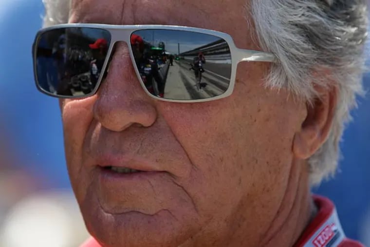 1969 Indy 500 champion Mario Andretti watches front he pit area during practice for the Indianapolis 500 auto race at the Indianapolis Motor Speedway in Indianapolis, Wednesday, May 15, 2013. (Darron Cummings/AP)