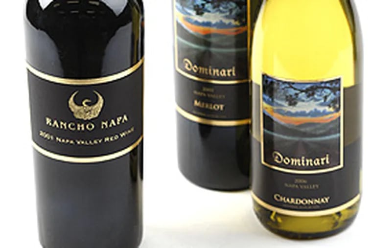 From left, Rancho Napa 2001 Red Wine, Dominari 2005 Nappa Valley Merlot, and Dominari 2006 Chardonnay. (Michael S. Wirtz / Inquirer).