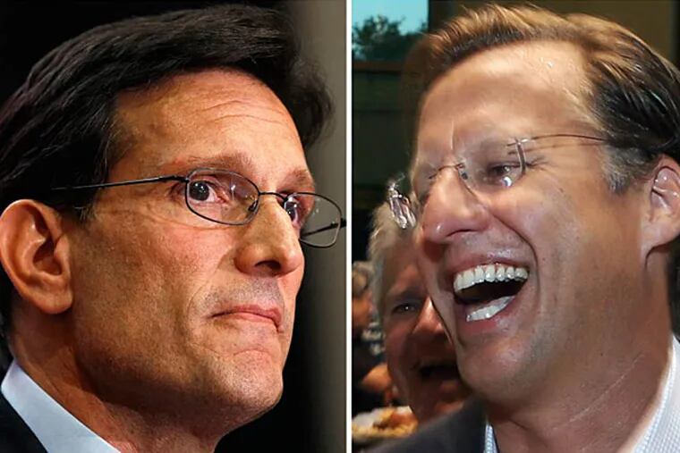 House Majority Leader Eric Cantor, R-Va., left, and Dave Brat, right, react after the polls close Tuesday, June 10, 2014, in Richmond, Va. Brat defeated Cantor in the Republican primary. (AP Photos)