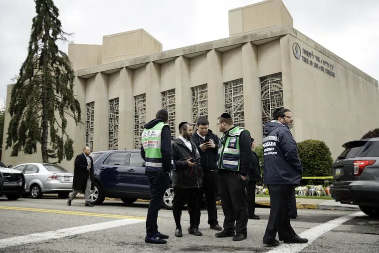 Personnel from Chesed Shel Emes Emergency Services and Recovery Unit gather near the Tree of Life Synagogue in Pittsburgh, Sunday, Oct. 28, 2018.