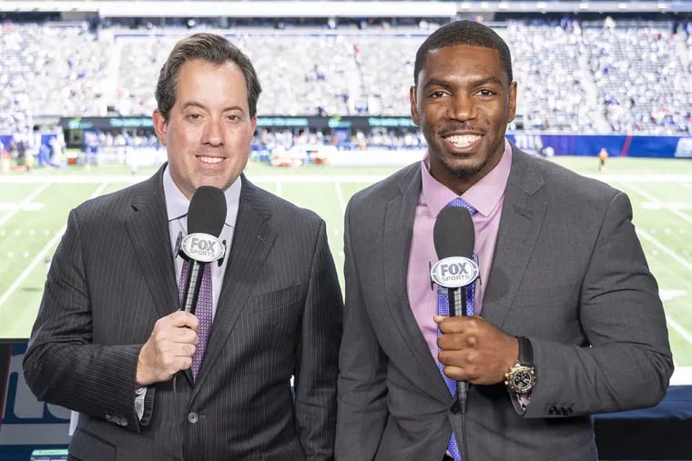 Fox Sports play-by-play announcer Kenny Albert (left), seen here along his broadcast partner Jonathan Vilma. Albert and Vilma will be on the call for Eagles-Lions on Sunday, their second straight Eagles game.