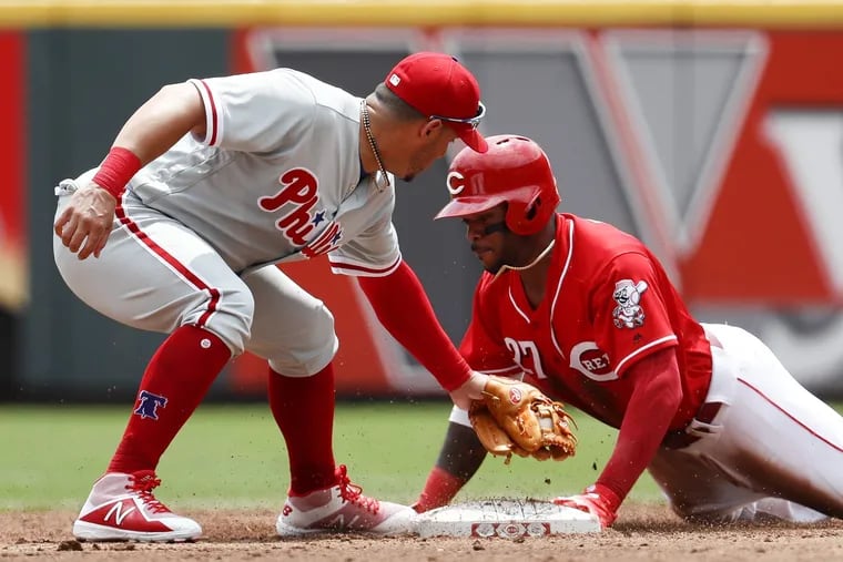Asdrubal Cabrera doesn't get the tag down on the Reds' Cincinnati Phillip Ervin in time during Sunday's loss in Cincinnati.
