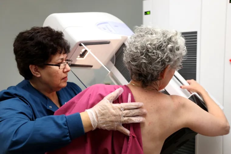 Blanca Rubio performs a mammogram on a 65-year-old patient at Evanston Hospital in Evanston, Ill., on Oct. 16, 2009. (Heather Charles/Chicago Tribune/TNS)