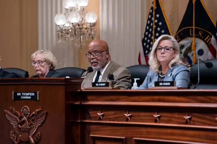 Chairman Bennie Thompson, D-Miss., center, flanked by Rep. Zoe Lofgren, D-Calif., left, and Vice Chair Liz Cheney, R-Wyo., makes a statement as the House committee investigating the Jan. 6 attack on the U.S. Capitol pushes ahead with contempt charges against former Donald Trump advisers Peter Navarro and Dan Scavino.