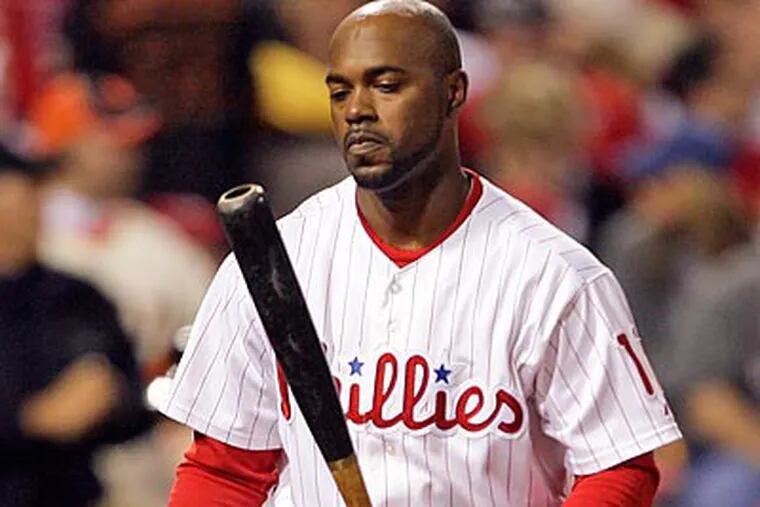 Jimmy Rollins had minor surgery on his left wrist.  (Yong Kim/Staff Photographer)