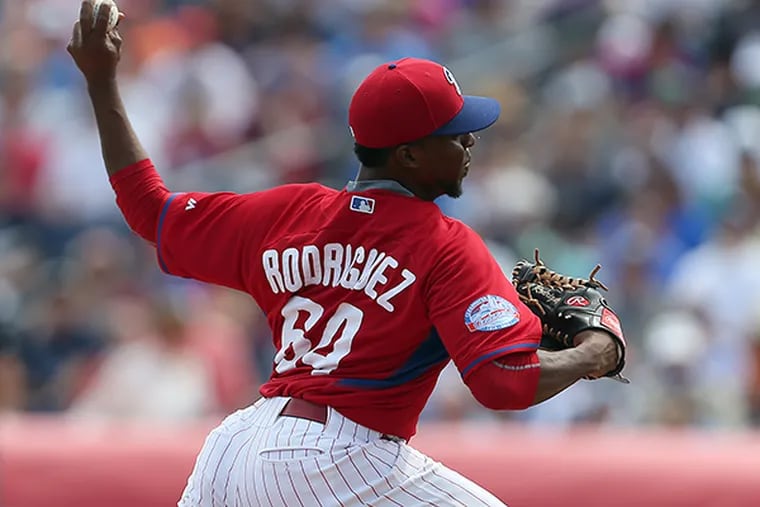 The Phillies' Joely Rodriguez pitches during the 1st inning as the
Phillies play the Tampa Bay Rays on March 13, 2015. (David Maialetti/Staff Photographer)