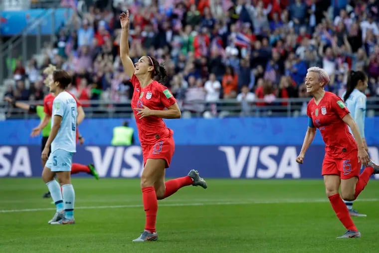 Alex Morgan (center) and Megan Rapinoe (right) have been criticized for excessively celebrating the U.S. women's soccer team's goals in their 13-0 rout of Thailand at the World Cup.