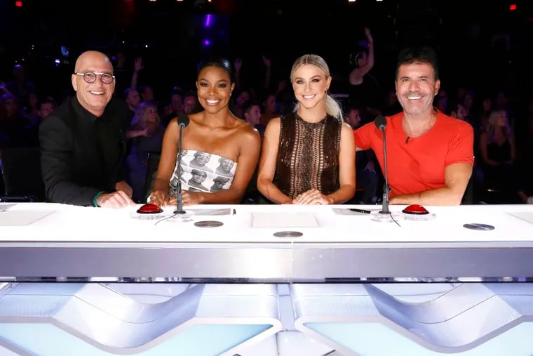 Celebrity judges, from left, Howie Mandel, Gabrielle Union, Julianne Hough, Simon Cowell on the set of "America's Got Talent," in Los Angeles.