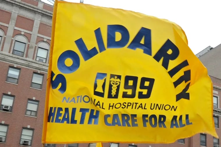 A District Council 1199C flag in a 2013 photo. One hundred workers at Delaware Valley Residential Care Center voted to join 1199C this week.