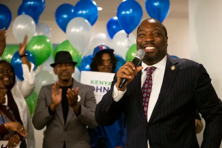 Second District Councilman Kenyatta Johnson celebrates with supporters at a hotel in Center City after winning the Democratic primary against lawyer Lauren Vidas.