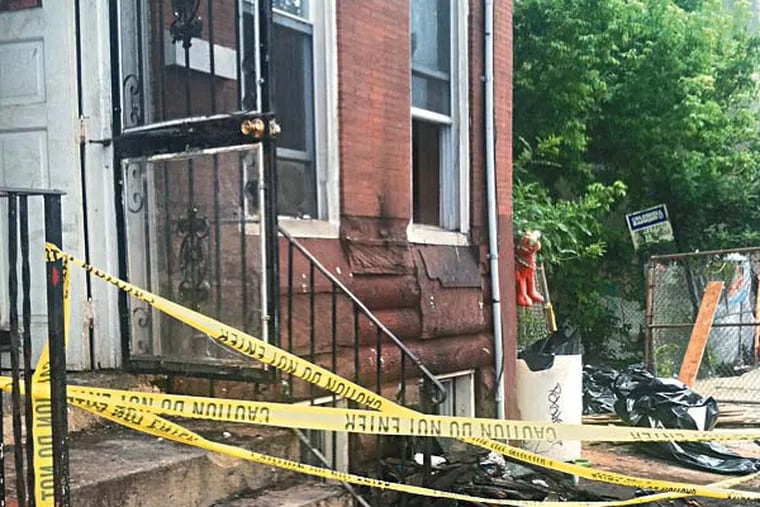 Two people were killed in a house fire at 1513 N. 6th St. Phila. ( Jane M . Von Bergen/ Staff Photographer)