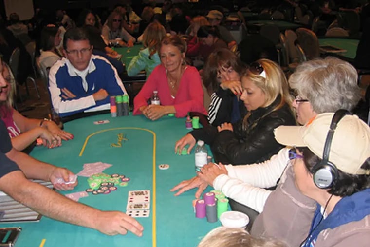 Abraham Korotki is shown playing poker with the women, including Nicole Rowe (third from right), in the Ladies No-Limit Texas Hold ’Em tournament at the Borgata.
