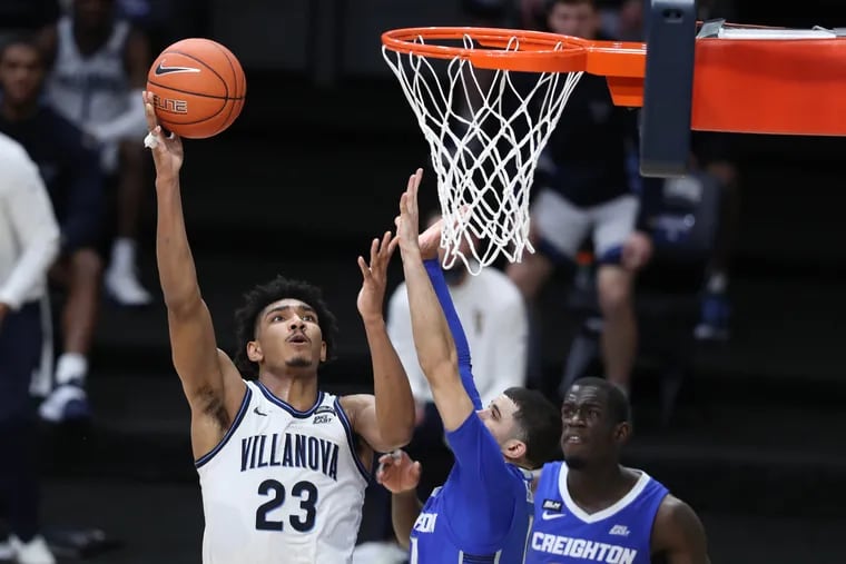 Jermaine Samuels (left), shooting over Marcus Zegarowski of Creighton on March 3, has helped Villanova in a number of areas with his versatility during its NCAA run.