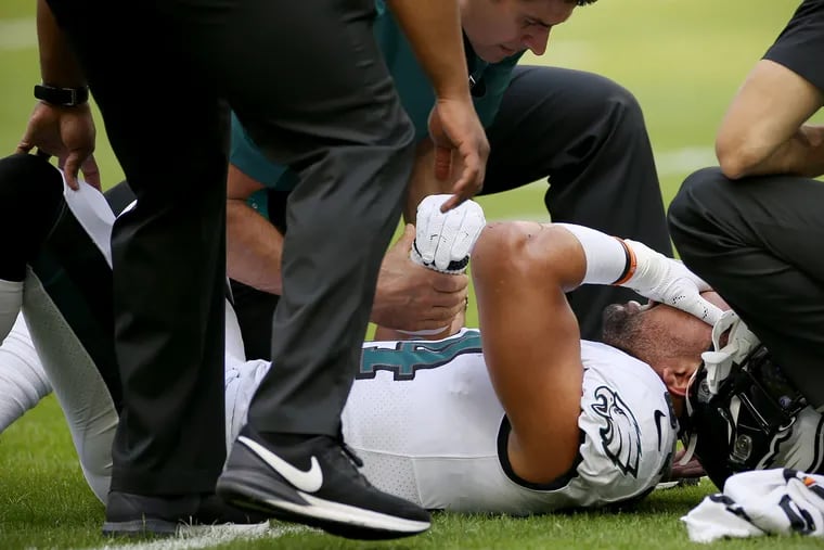 Medical staff check on Eagles linebacker Kamu Grugier-Hill after he was injured at the beginning of the game against the Miami Dolphins. He had a concussion but continued to play.