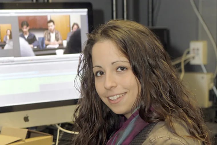 Temple senior Alyssa Lomuscio in the video-editing room. She hopes her film will help others understand obsessive compulsive disorder. (Akira Suwa / Staff Photographer)
