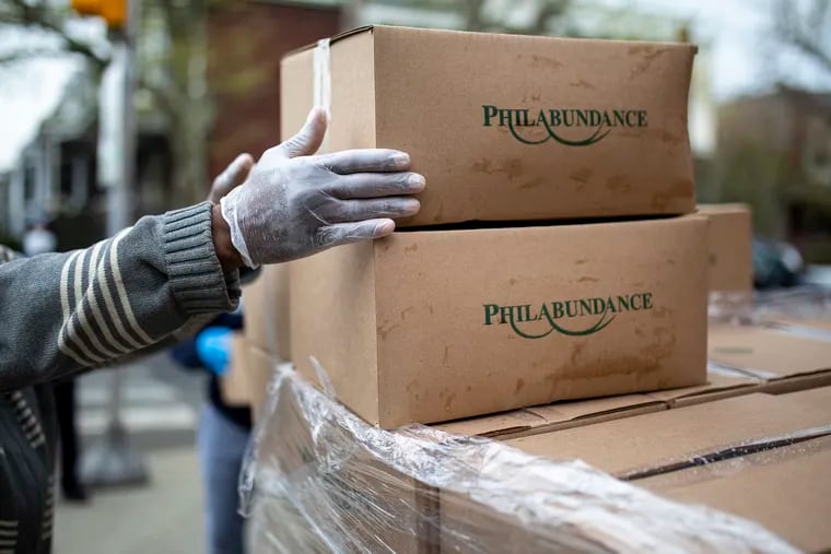 In April, volunteers handed out boxes of packaged food from Philabundace families and residents in the area at the corner of 59th Street and Lansdowne Avenue.