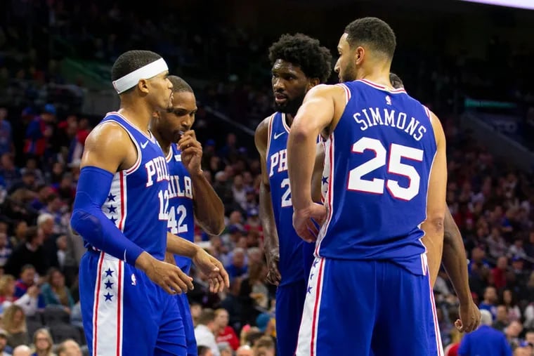 Tobias Harris (12), Al Horford (42), Joel Embiid (center), Ben Simmons (25)  were part of a towering starting lineup.