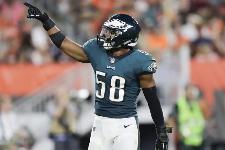 Eagles linebacker Jordan Hicks points against the Cleveland Browns during a preseason game at FirstEnergy Stadium in Cleveland on Thursday, August 23, 2018. YONG KIM / Staff Photographer