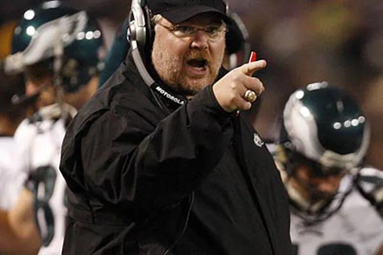 "I am not looking ahead a lick," Eagles coach Andy Reid said after his team beat the Vikings to set up a second-round playoff date with the Giants. (David Maialetti / Staff Photographer)