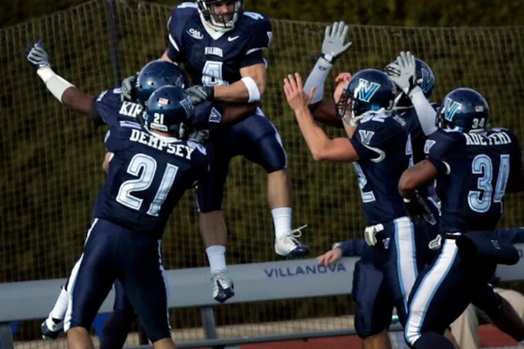 Matt Szczur (4) is joined in celebration by teammates after returning opening kickoff against Colgate 91 yards for TD.