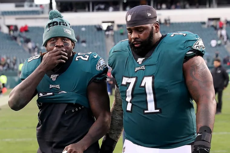 Jason Peters, right, walks off the field with Jay Ajayi after the Eagles lost to the Seahawks.
