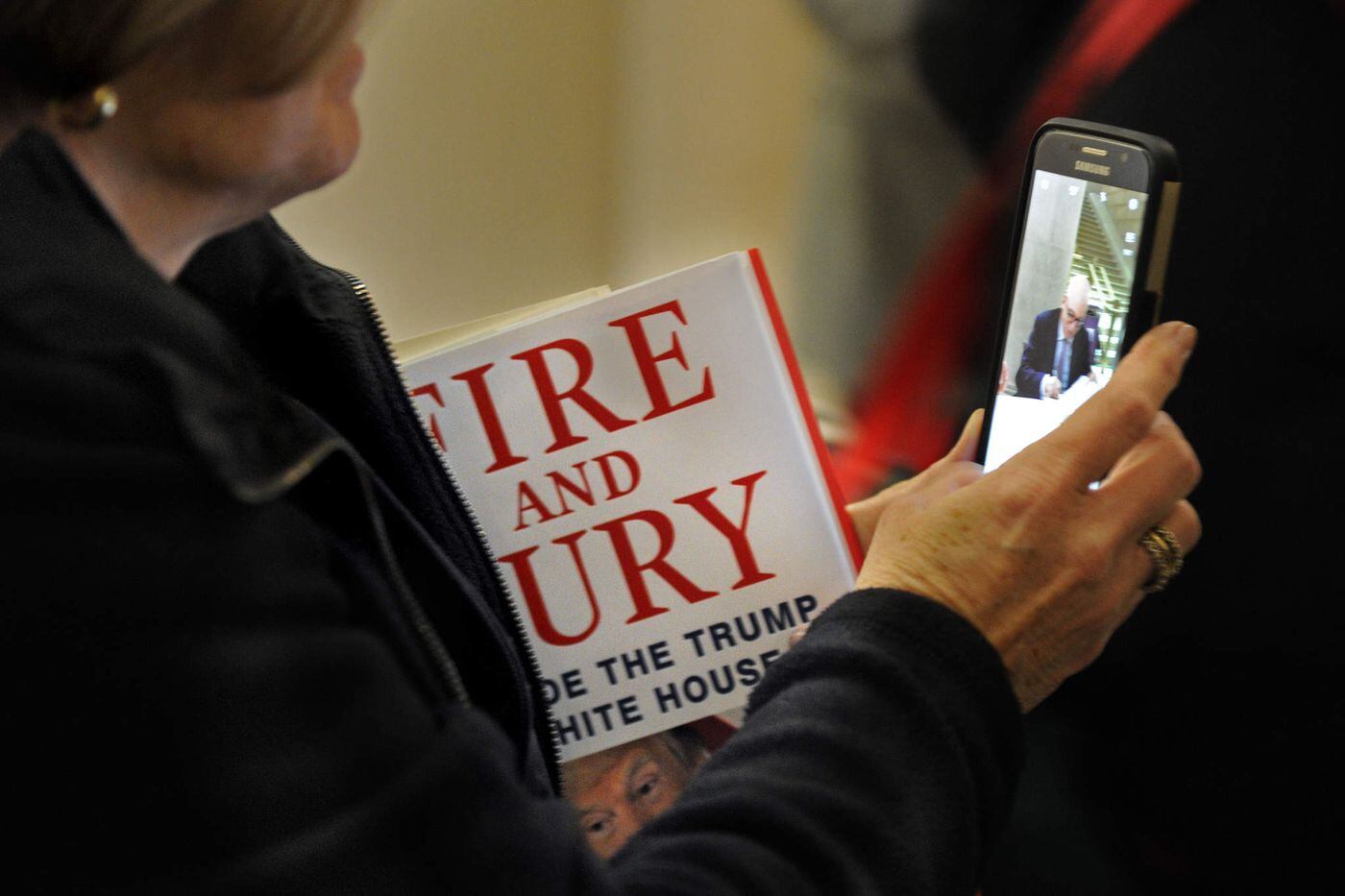 The “guidelines” for the book signing stipulated: “Mr. Wolff will sign but not personalize books. No Photos.”