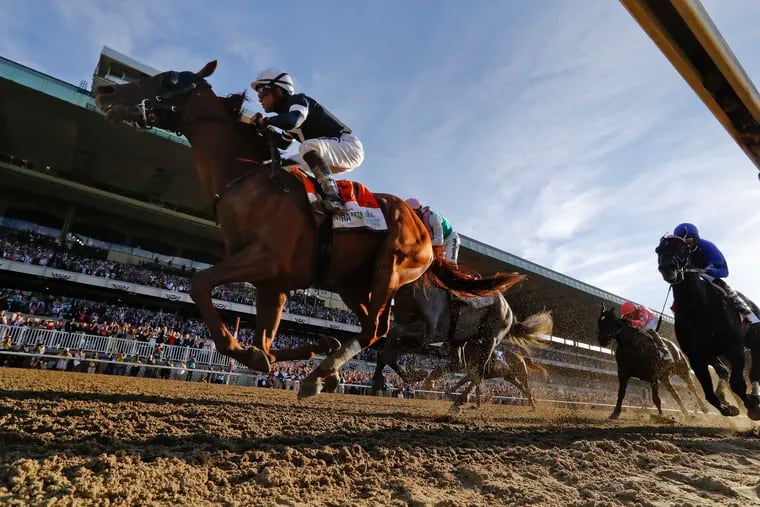 Sir Winston (7), with jockey Joel Rosario up, crosses the finish line to win the 151st running of the Belmont Stakes horse race, Saturday, June 8, 2019, in Elmont, N.Y. (AP Photo/Seth Wenig)