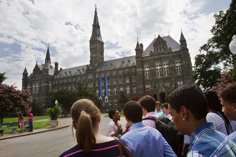 FILE – In this July 10, 2013, file photo, prospective students tour Georgetown University's campus in Washington. The good news is that Americans are saving more than ever for college. The bad news is that the average amount still isn’t enough to cover one year at a four-year public university. In a report released Tuesday. Sept. 9, 2014, the College Savings Plans Network found that the average college savings or prepaid tuition account is now worth about $20,671 _ almost double what these “529” accounts were worth during the dog-days of the recession. (AP Photo/Jacquelyn Martin, File)