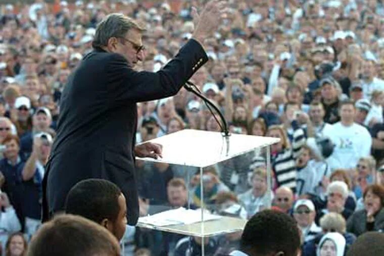 Penn State coach Joe Paterno fires up the faithful at a huge pep rally held at Beverly Hills High School today in advance of the Rose Bowl. (Clem Murray / Staff Photographer)