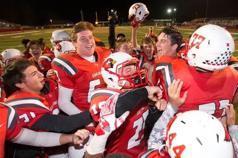 The Upper Dublin team celebrates after its 24-14 victory over Pennsbury in the District 1 Class AAAA semifinals on Friday night.