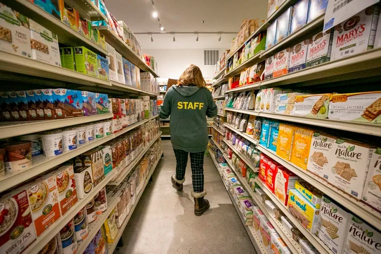 Lori Burge, general Manager at South Philly Food Co-op, making way through the store. The co-op  at 2031 S. Juniper St. in Philadelphia opens to the public December 23, 2020.