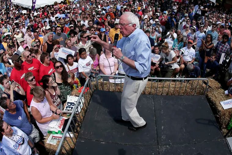 Bernie Sanders, shown at a 2019 rally, has drawn supporters with a populist message that emphasizes affordable health care. But Joe Biden and President Trump also talk about the problem, which has only escalated in recent years.