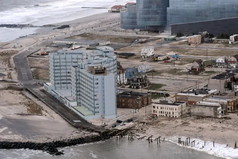 The northern tip of Atlantic City on Tuesday, Oct. 30, 2012, shows where the boardwalk was destroyed after Hurricane Sandy blew across the area. The now-closed Revel Casino is in the top portion of the photo. ( CLEM MURRAY / Staff Photographer )