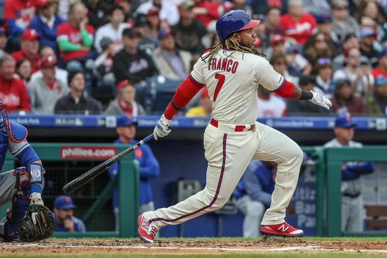 Maikel Franco hits a sacrifice fly in the second inning against the Mets.