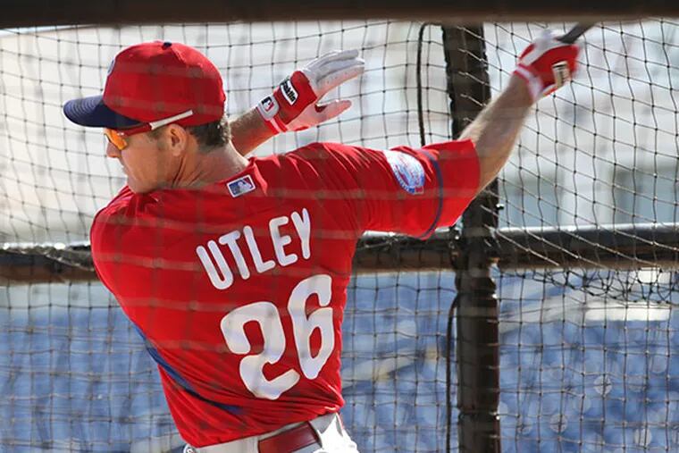 Chase Utley takes batting practice at Bright House Field in
Clearwater, Fla. (David Swanson/Staff Photographer)