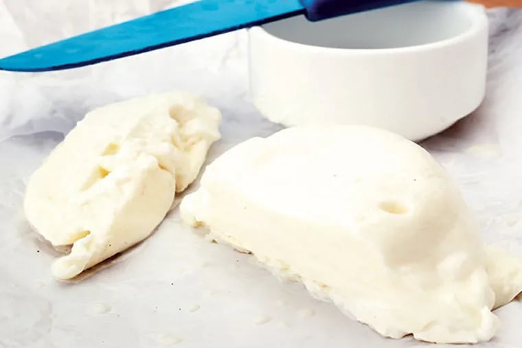 Close up beaty shot of the goat cheese burrata - a cream stuffed mozzarella made with goat's milk.  ( MICHAEL BRYANT / Staff Photographer  )