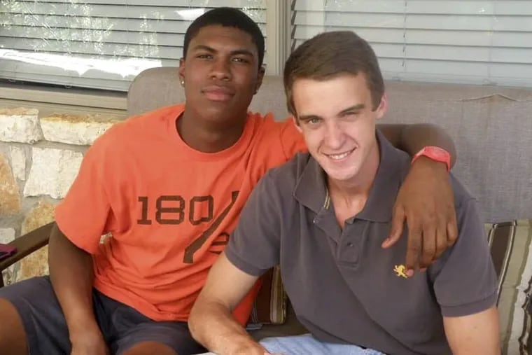Bakari Henderson (left) with his friend Travis Jenkins in Austin, Texas. Henderson was beaten to death early Friday, July 7, 2017, at a bar in Lagana on the Greek island of Zakynthos.