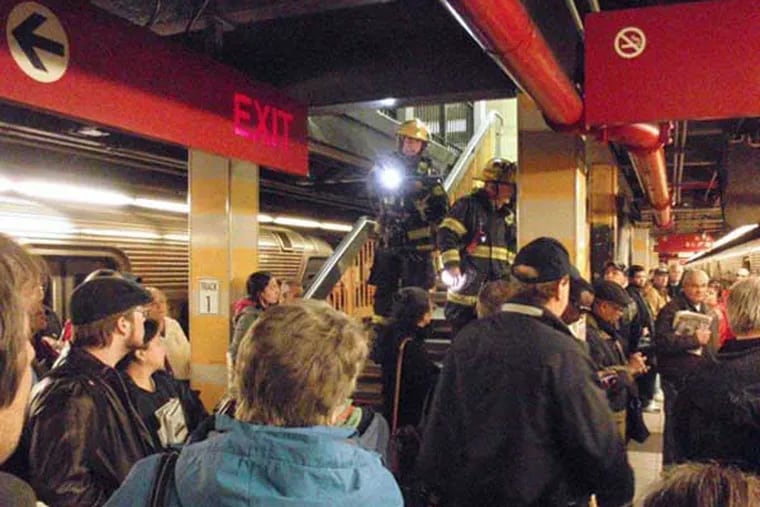 PATCO platform at 16th/Locust on Friday, March 21 as firefighters responded to smoke in the subway..Photo: Hoag Levins