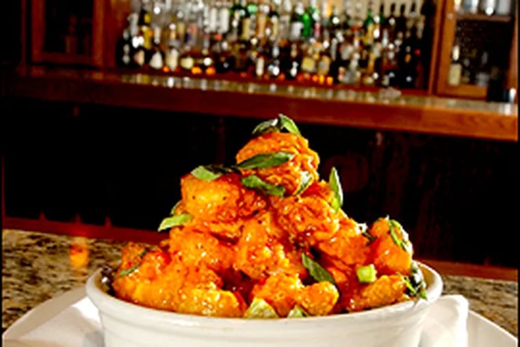 Bang Bang Shrimp, with its spicy glaze, is a highlight at Bonefish Grill.                                      (Rose Howerter/Inquirer)