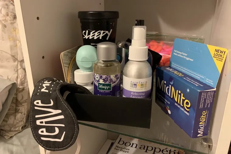 Emily Tharp's nightstand is crowded with items to help her sleep, ranging from an eye mask, sleep supplements, pillow sprays and essential oils. The retail sleep aid industry is booming over the last couple years as more consumers focus on sleep as part of overall wellness.