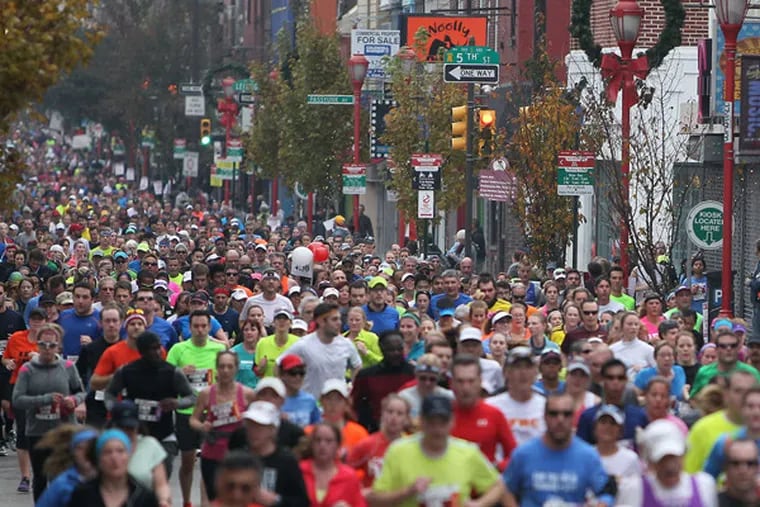 Runners on South Street during the Philadelphia Marathon in November, on one of the rare days when they are welcome on city paths.